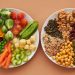 A vibrant flatlay of colorful vegetables and nuts showcasing a balanced diet concept.